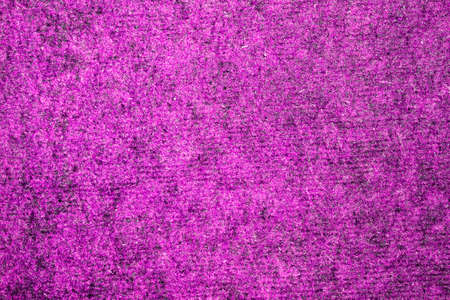 Uneven abstract surface texture of violet color. Space for lettering or design.の写真素材