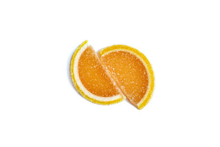 Two slices of marmalade in sugar on a light background. Composition of sweets