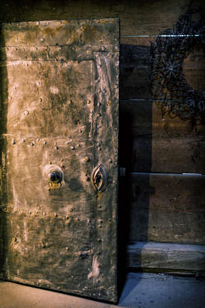 Vertical colour image of beautiful metal attic doorの写真素材