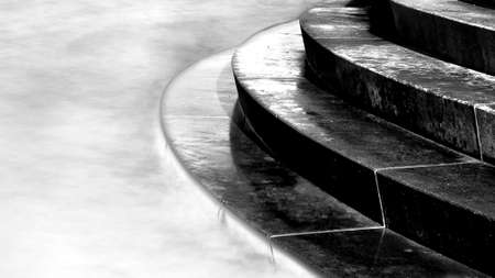 Horizontal black   white image of steps leading into sea, Portobello, Edinburgh, Scotlandの写真素材