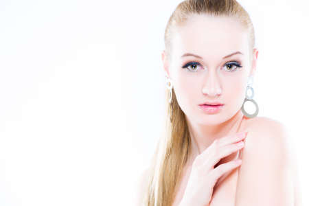 Horizontal color image  Beauty Portrait  On white background  Perfect Fresh Skin closeup  Isolated on White Background  Pure Beauty Model  Youth and Skin Care Conceptの写真素材