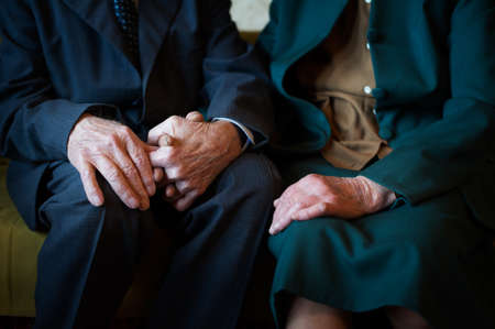 Cute 80 plus year old married couple posing for a portrait in their house  Love forever concept  の写真素材