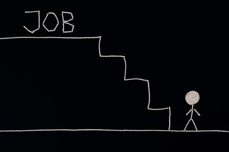Man at the bottom of the stairs looking for a job, ready to succeed, Unusual conceptの写真素材