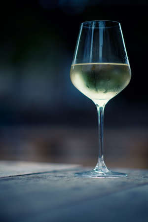 color image of chilled white wine in a glass , with copy spaceの写真素材
