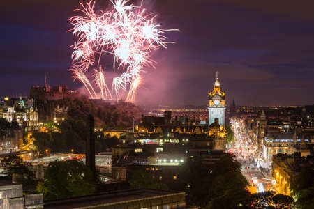 Edinburgh Cityscape with fireworks over The Castle and Balmoral Clock Towerのeditorial素材