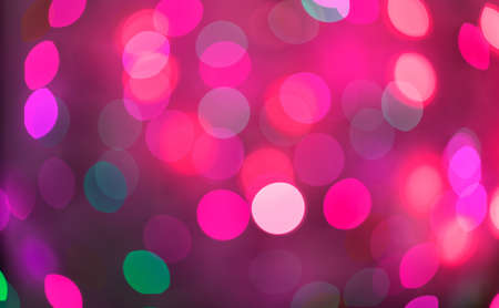Pink and red holiday bokeh. Abstract Christmas background, christmas lights backroundの写真素材