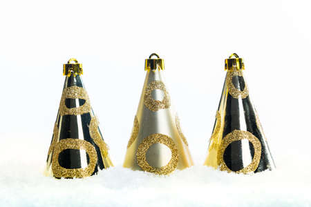 Golden Christmas decorations in snow, Xmas banner, christmas background with copy space