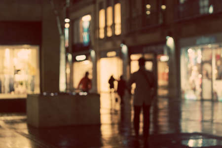 Artistic style - Defocused, blurred urban shopping mall backgroundの写真素材
