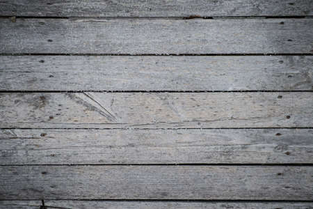 dark grey wooden background textureの写真素材