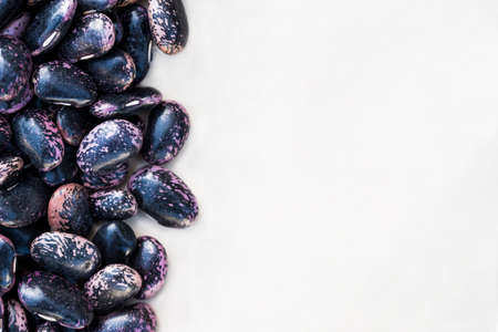 Purple beans on white background close upの写真素材