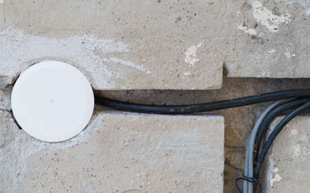 electric wire cables in cement wall