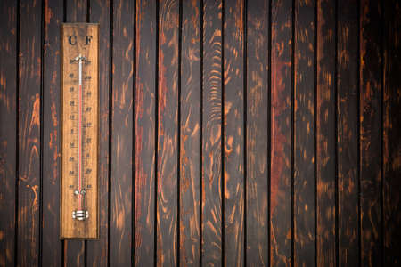 Thermometer showing high temperature, summer and heatwave conceptの写真素材
