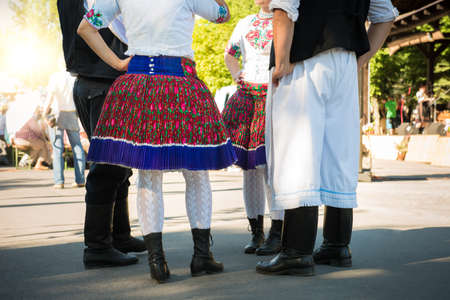 Anonymous group of people in folklore costumesの写真素材
