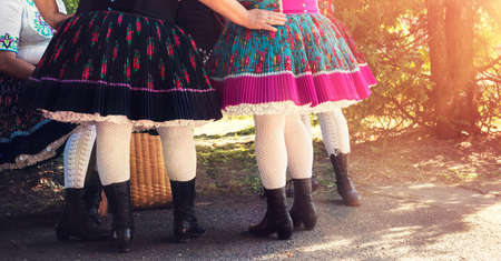 Anonymous senior female friends in folklore costumesの写真素材