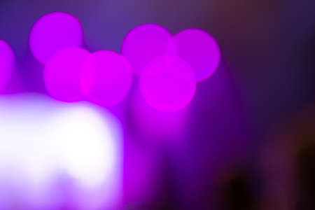 Abstract purple concert lights bokeh backgroundの写真素材