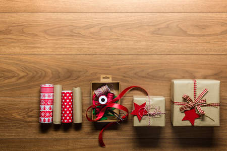 Beautiful retro gift wrapping, xmas concept, desk view from above with copy space
