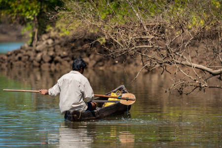 GOA, INDIA - Indian fisherman on a boatのeditorial素材