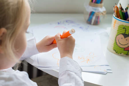 Creativity concept. Little girl drawingの写真素材