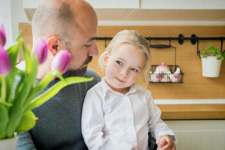 Father and daughter in the kitchen, fathers day concept, real familyの写真素材