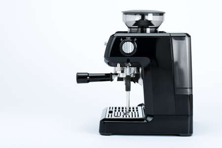 Isolated black manual coffee maker with grinder on a white background, side viewの写真素材