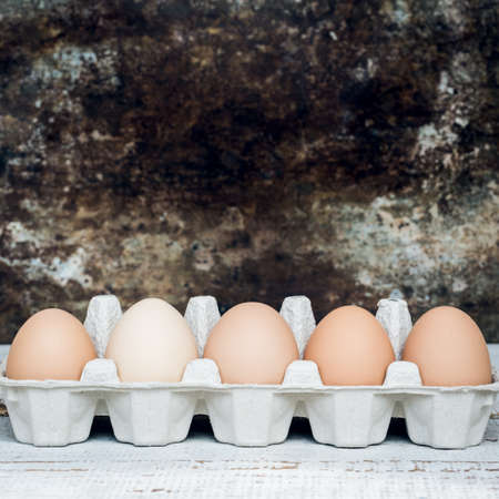 Five natural uncolored easter eggs, happy easter retro background