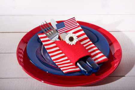 Beautiful blue red and white table settingの写真素材
