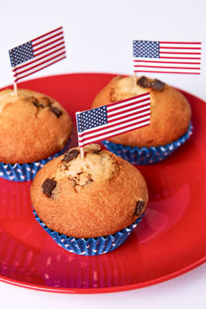 Cute cupcakes with american flag on white backgroundの写真素材