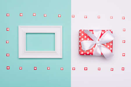 Happy Mother's Day, Women's Day, Valentine's Day or Birthday Background. Pastel Blue Candy Colour  flat lay web banner with beautifully wrapped present.の写真素材