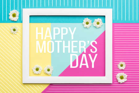 Happy Mother's Day Pastel Coloured Background. Floral flat lay minimalism greeting card.の写真素材
