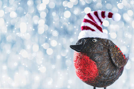 Cute Christmas Bird in Winter Wonderland. Christmas background with copy space.の写真素材