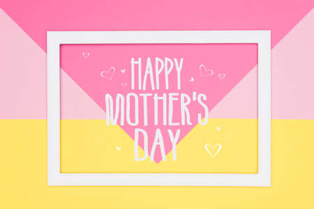 Happy Mothers Day abstract geometrical pastel pink and yellow paper flat lay background. Minimalism,...