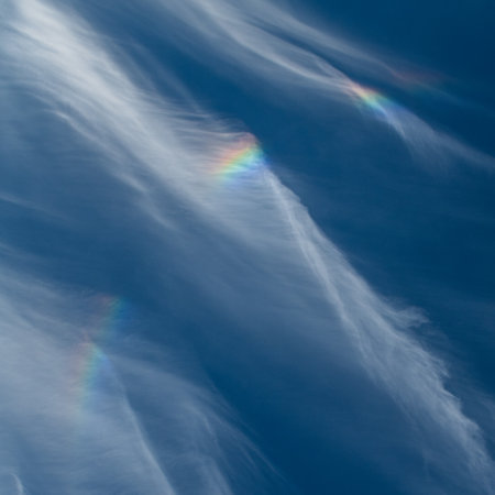 Fire rainbow. Spectacular Iridescent Cloud. A Rare Glimpse of Prismatic Fire Rainbow. Beautiful atmospheric phenomena.の写真素材