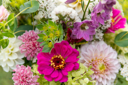 Summer bouquet top view close up. Beautiful multi colored fresh flower arrangement. Birthday weddding bouquet.の写真素材
