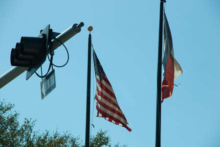 HOUSTON, TEXAS - March, 2022: 
 American flag on the urban spaceの写真素材