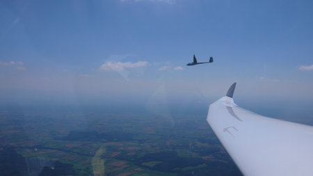 Sailplane Wing View blue sky duo Discusの写真素材