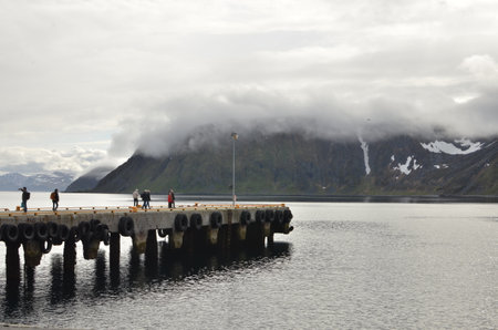 Harbour with smal fishing boats Norway rough cold wetの写真素材