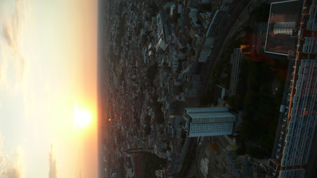 Sunset over City dark calm sun backgroundの写真素材