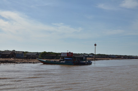 Boats an Fisherman Mekong River phnom Phen Cambodiaの写真素材