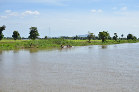 Boats an Fisherman Mekong River phnom Phen Cambodiaの写真素材