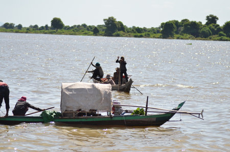 Boats an Fisherman Mekong River phnom Phen Cambodiaの写真素材