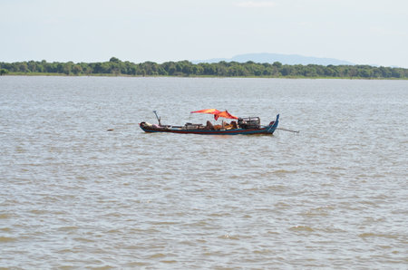 Boats an Fisherman Mekong River phnom Phen Cambodiaの写真素材