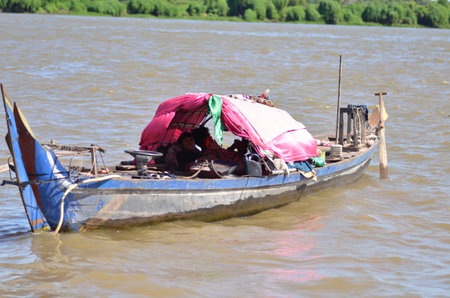 Boats an Fisherman Mekong River phnom Phen Cambodiaの写真素材