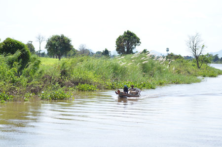 Boats an Fisherman Mekong River phnom Phen Cambodiaの写真素材