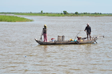 Boats an Fisherman Mekong River phnom Phen Cambodiaの写真素材