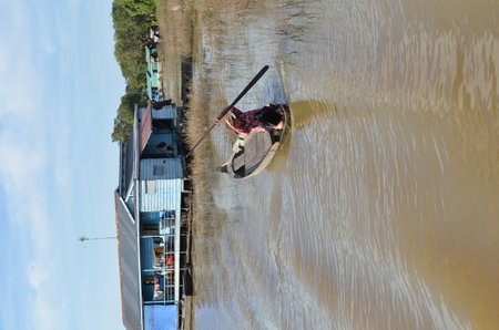 Boats an Fisherman Mekong River phnom Phen Cambodiaの写真素材
