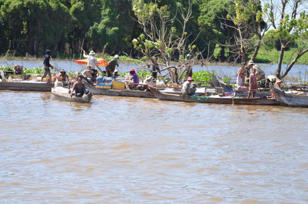 Boats an Fisherman Mekong River phnom Phen Cambodiaの写真素材