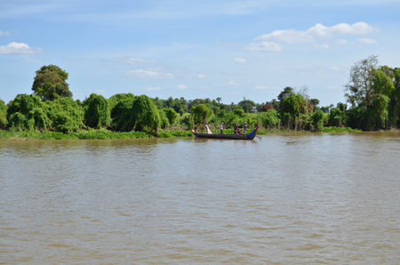 Boats an Fisherman Mekong River phnom Phen Cambodiaの写真素材