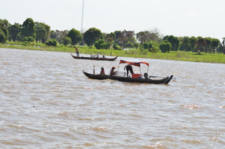 Boats an Fisherman Mekong River phnom Phen Cambodiaの写真素材