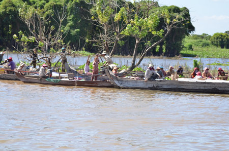 Boats an Fisherman Mekong River phnom Phen Cambodiaの写真素材