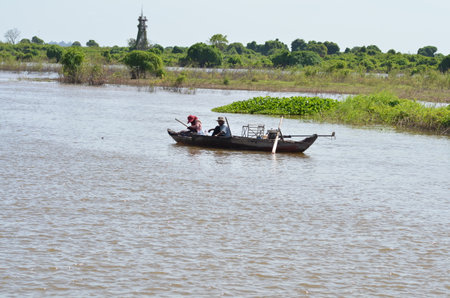 Boats an Fisherman Mekong River phnom Phen Cambodiaの写真素材